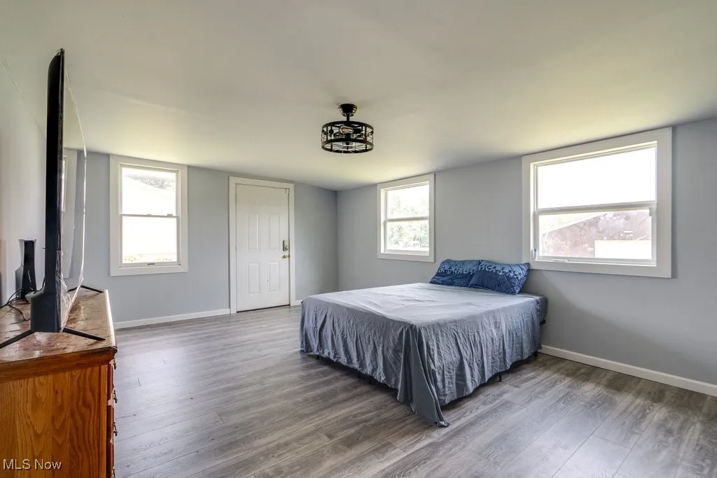 Bedroom featuring wood finished floors