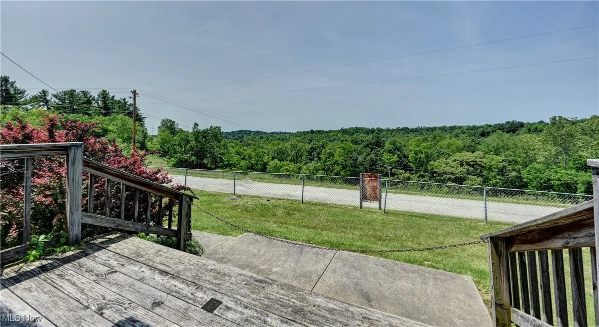 Deck with a wooded view