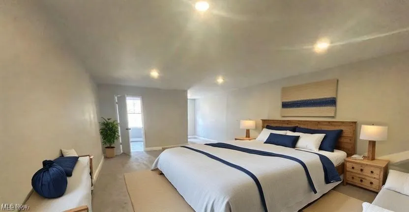 Bedroom featuring recessed lighting and carpet floors
