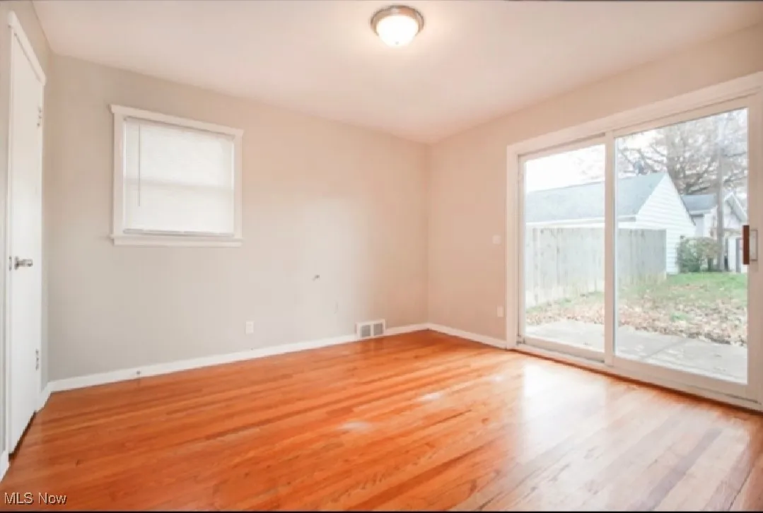 Empty room with light wood-style floors