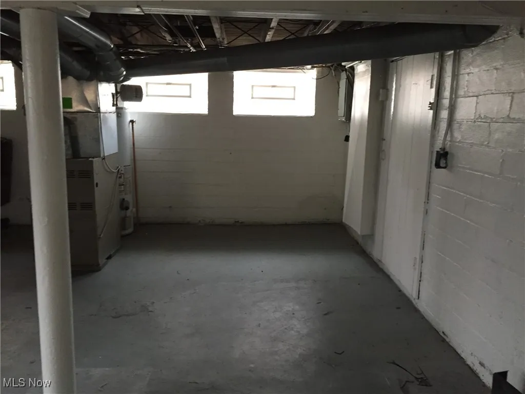 Below grade area with concrete block wall