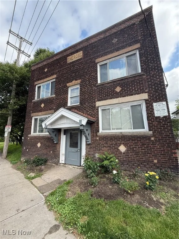View of front facade with brick siding