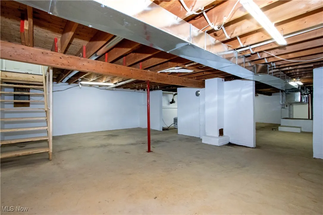 Unfinished below grade area with stairway