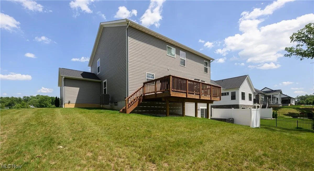 Rear view of property with a deck