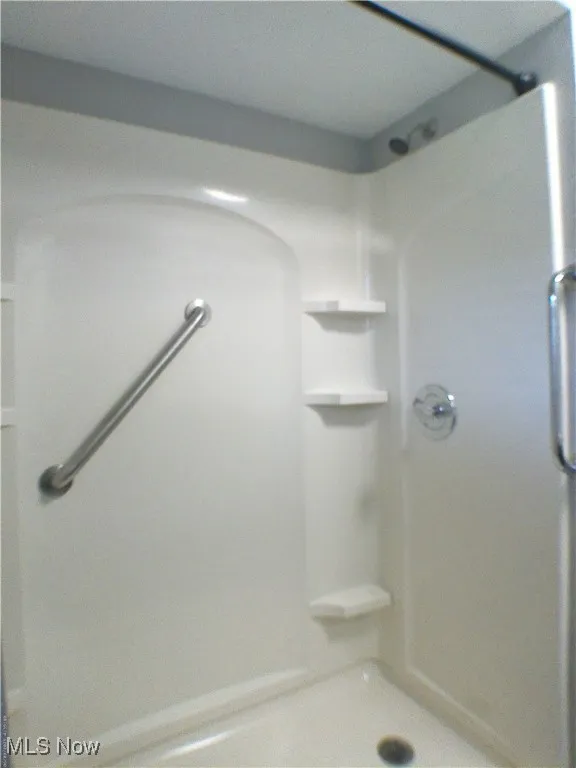 Full bathroom with a shower
