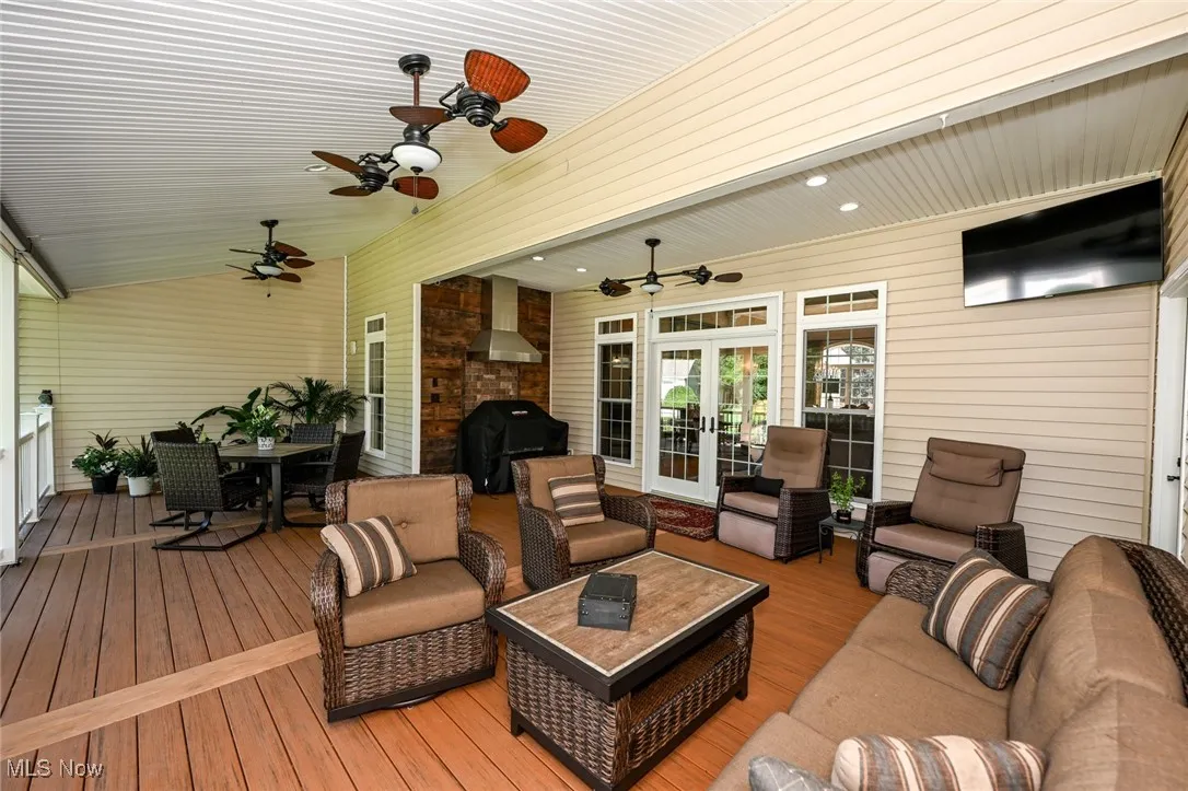Rear covered deck off the main level living room.