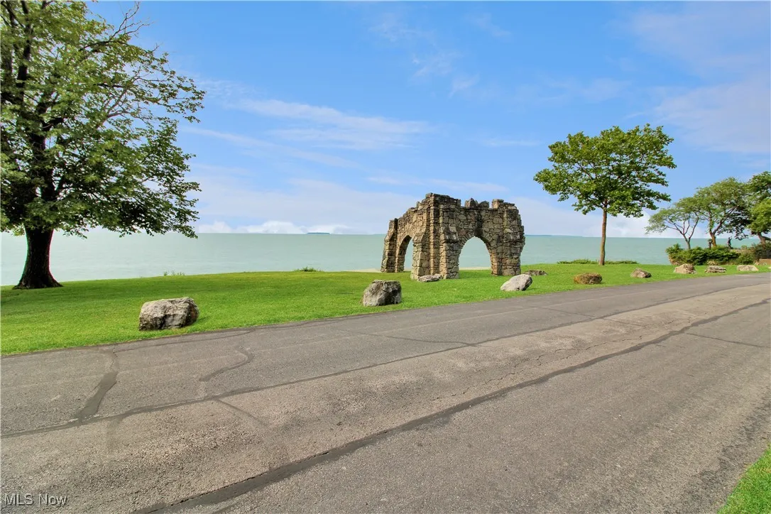 View of asphalt street featuring a water view