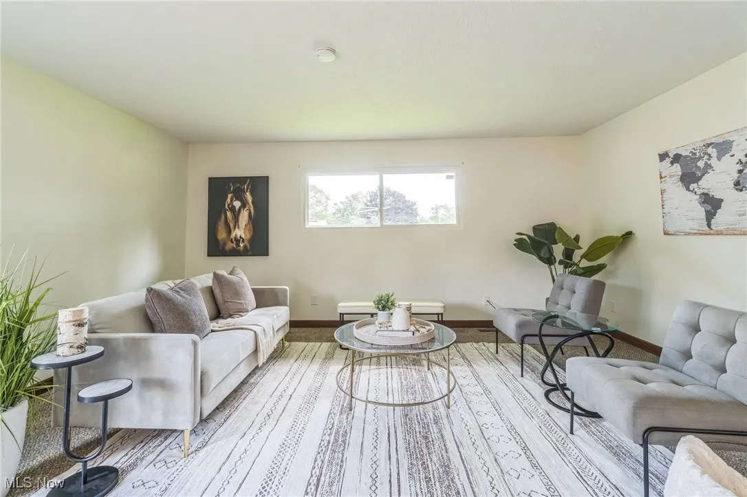 Living room featuring baseboards