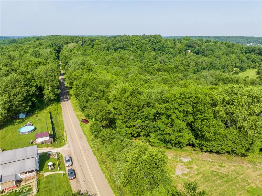 Drone / aerial view of a heavily wooded area