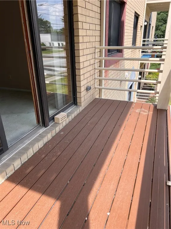 View of wooden deck off the living room.