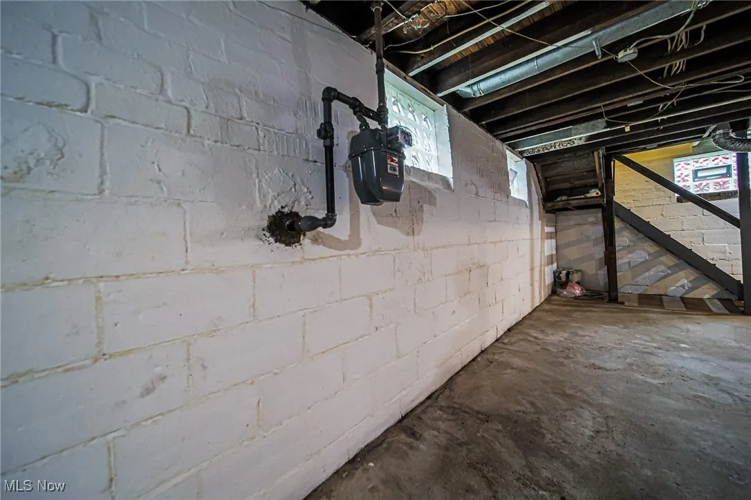 Below grade area with gas meter
