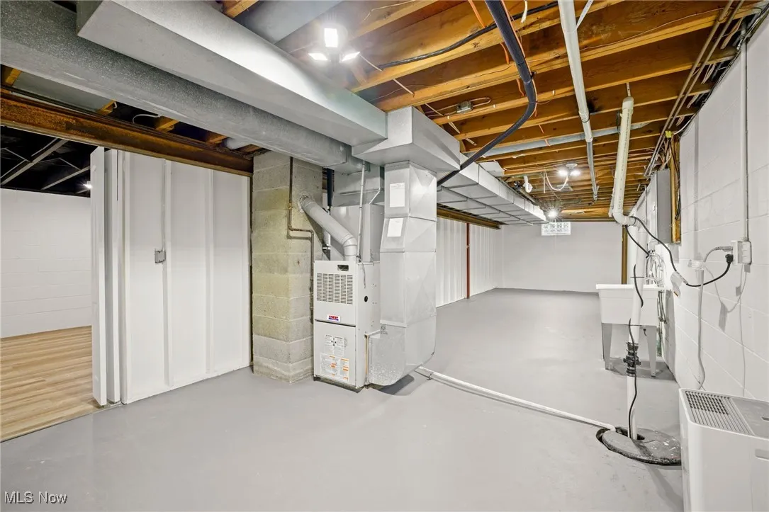 Unfinished basement with heating unit