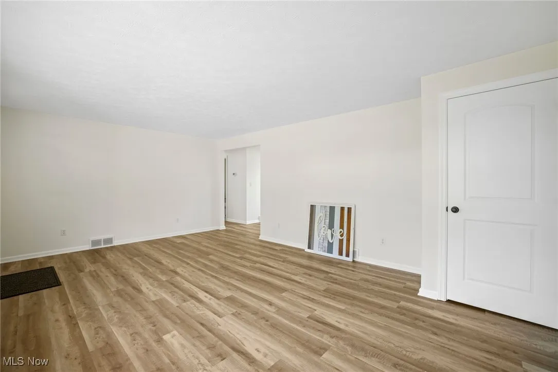 Spare room with light wood finished floors