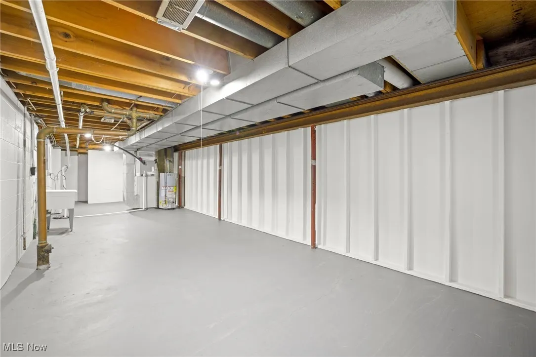 Unfinished basement with water heater