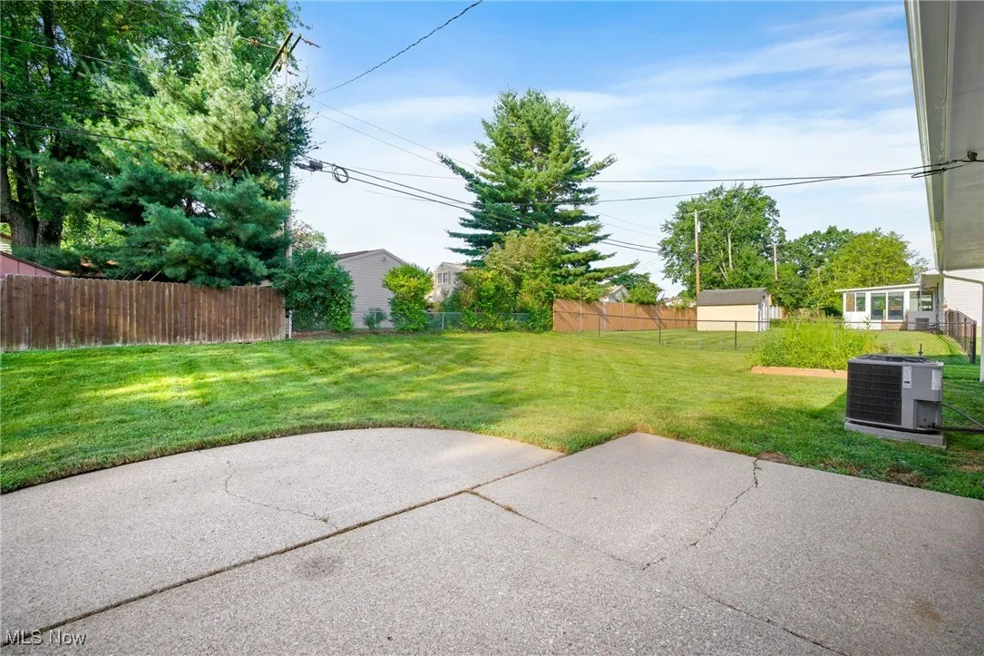 View of yard with a patio
