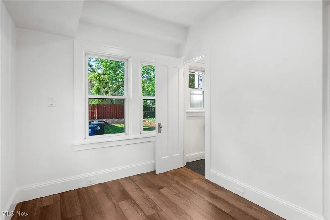 Empty room featuring healthy amount of natural light.