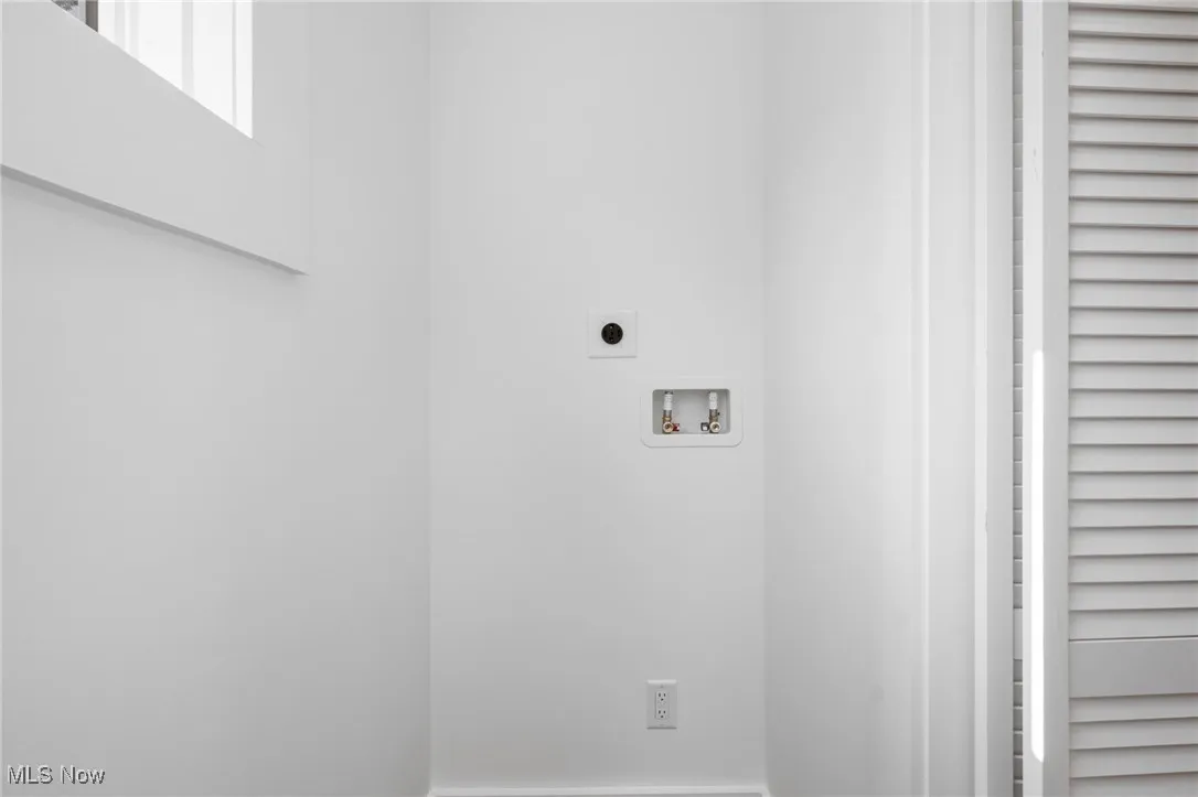 Laundry area with electric dryer hookup and hookup for a washing machine