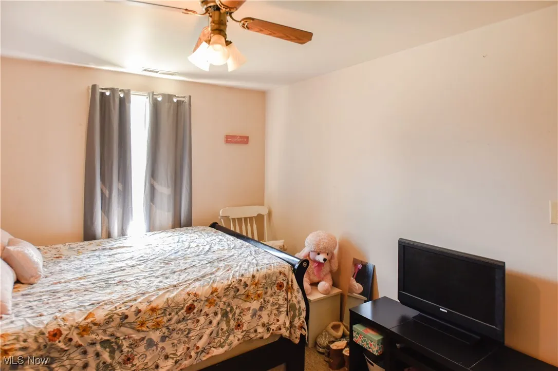 Bedroom with a ceiling fan