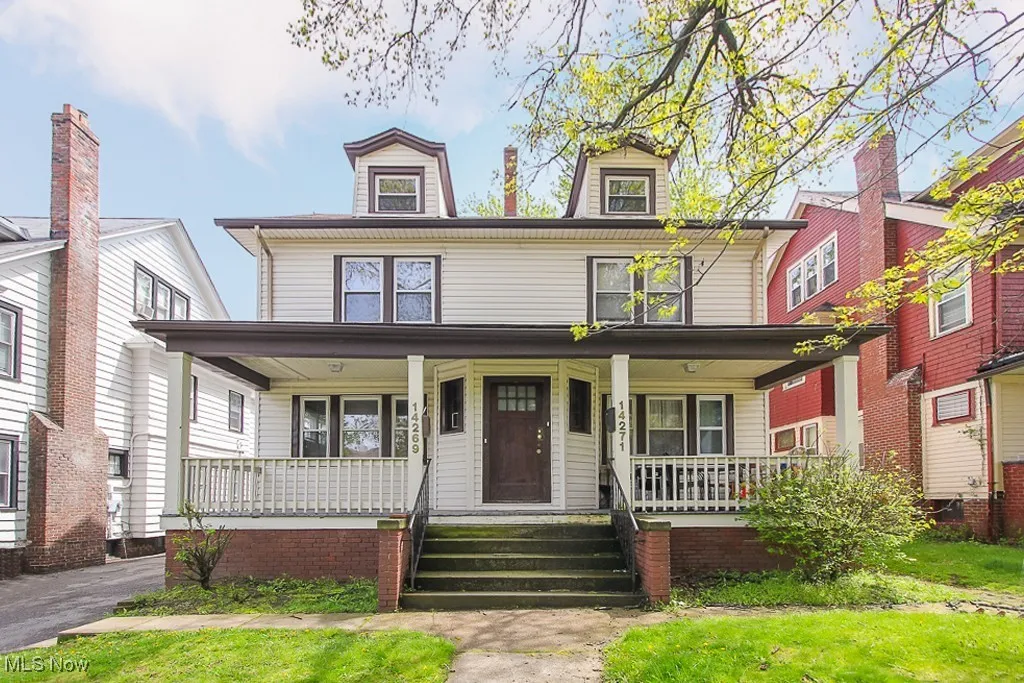 Traditional style home with a porch