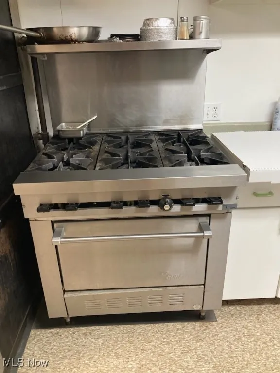 Kitchen view of stainless steel range
