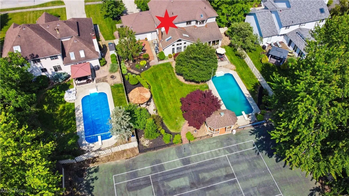 Aerial view of residential area with a pool area