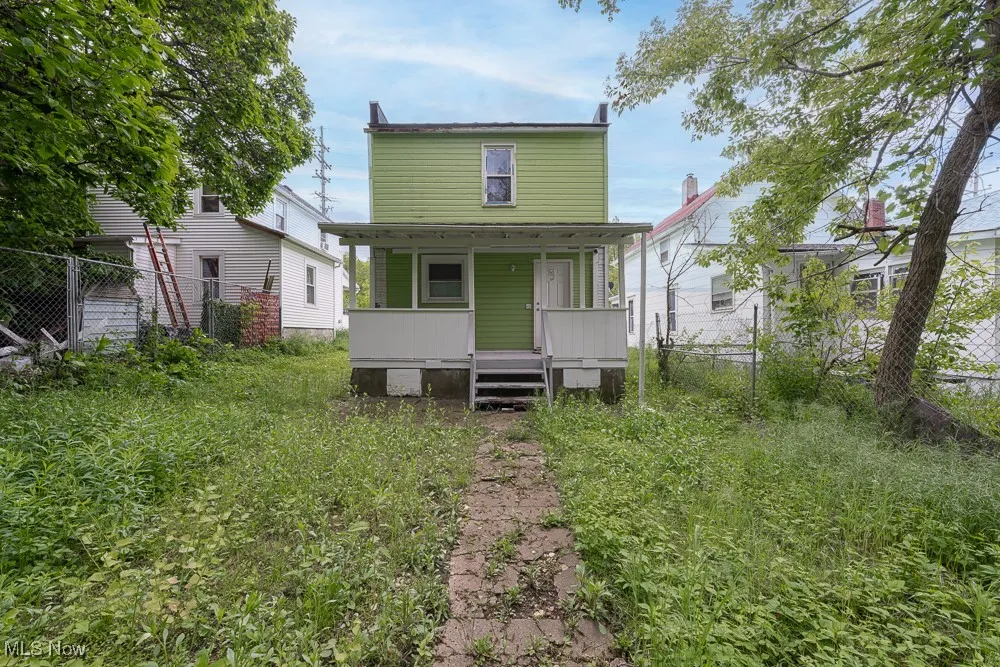 Rear view of house with a porch