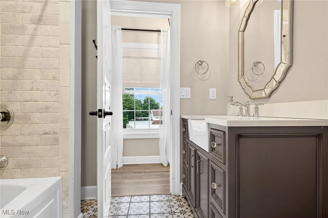 Full bathroom with vanity and shower / bathtub combination
