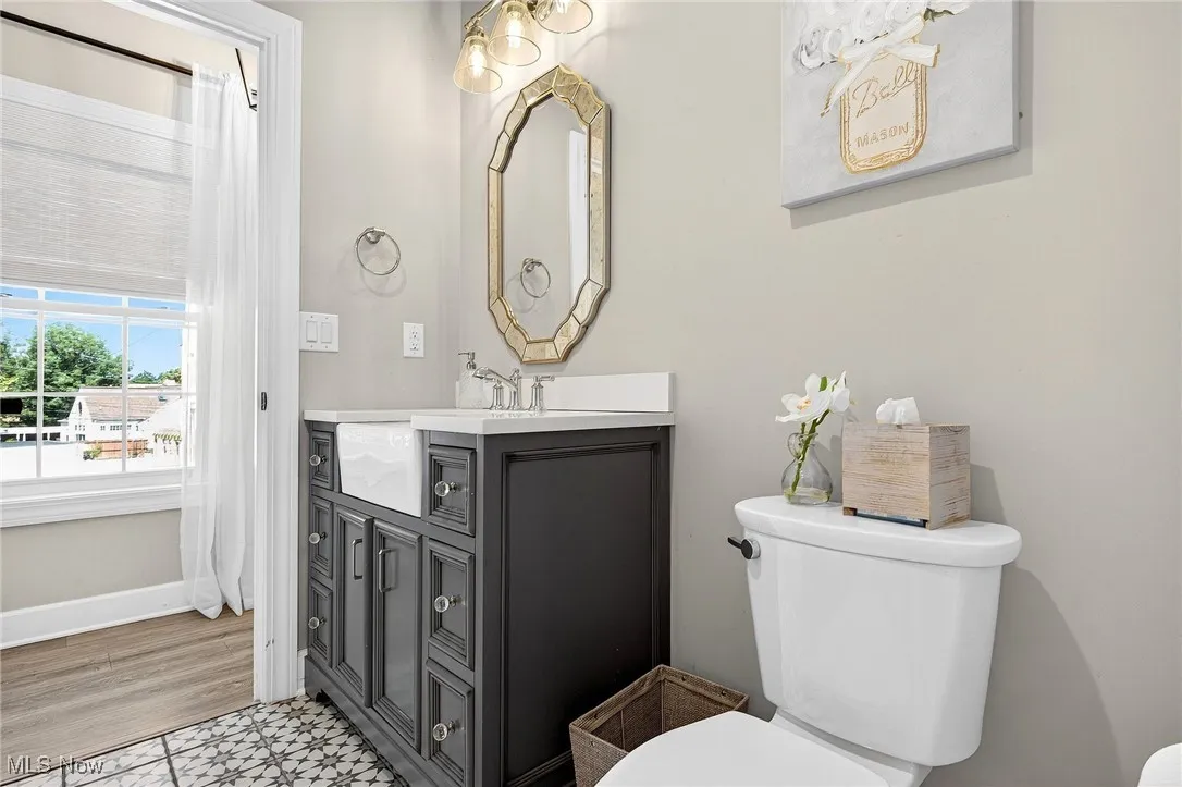 Bathroom featuring vanity and tile patterned floors