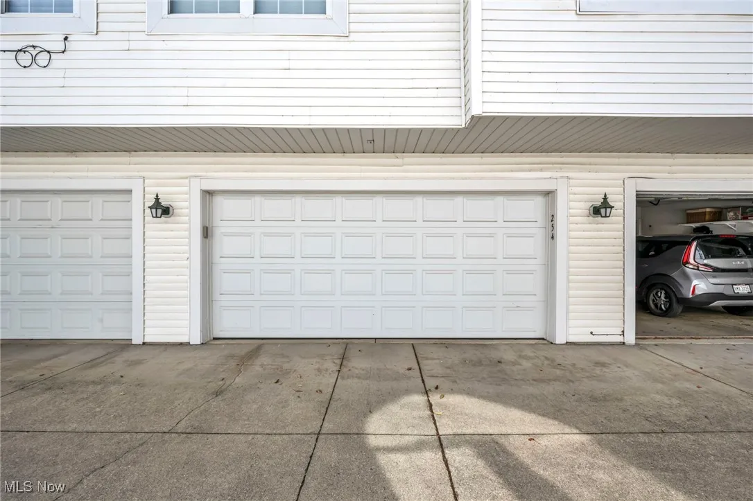 Garage with concrete driveway