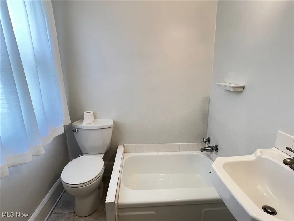 First floor full bath off mud room/pantry