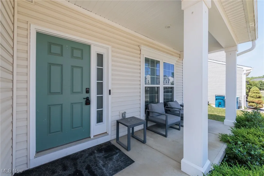 Entrance to property with covered porch