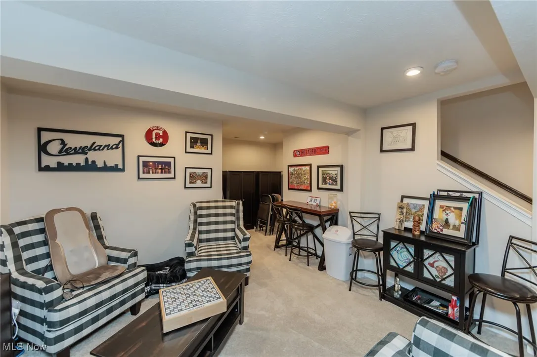 Sitting room featuring carpet floors and recessed lighting