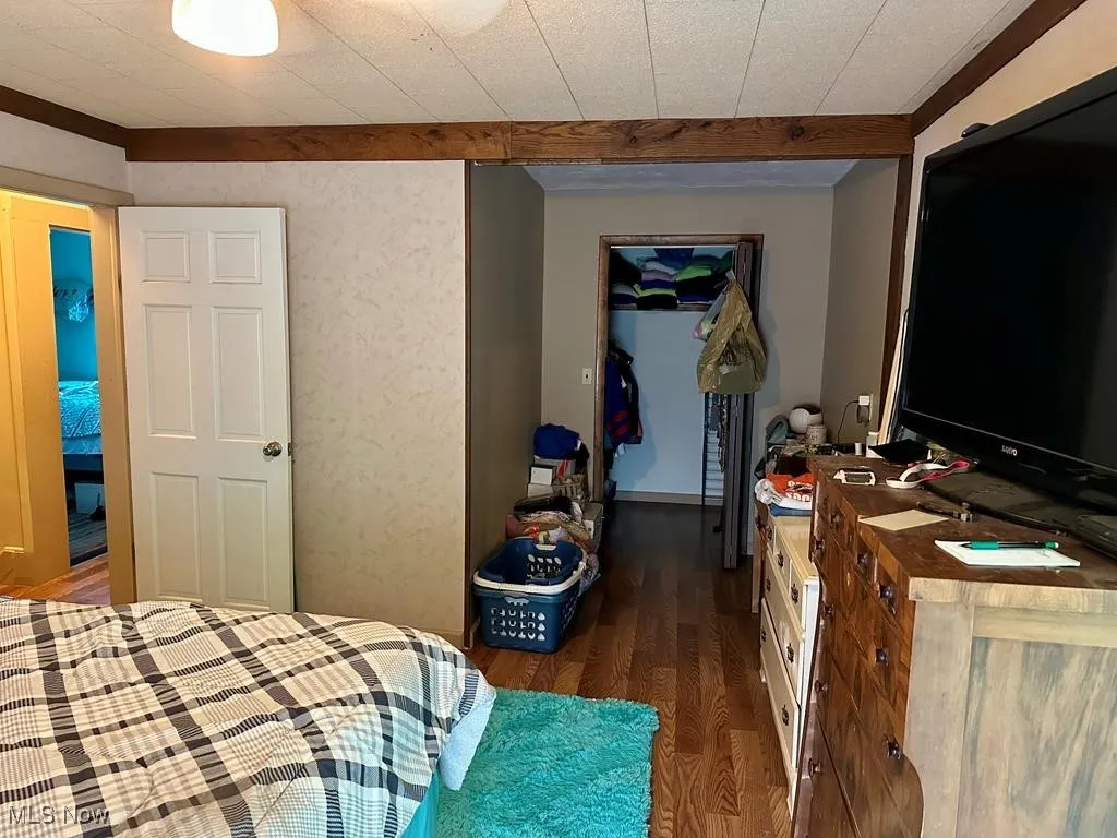 Bedroom featuring wood finished floors
