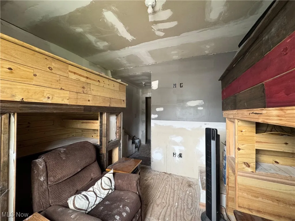 Bedroom with wood finished floors