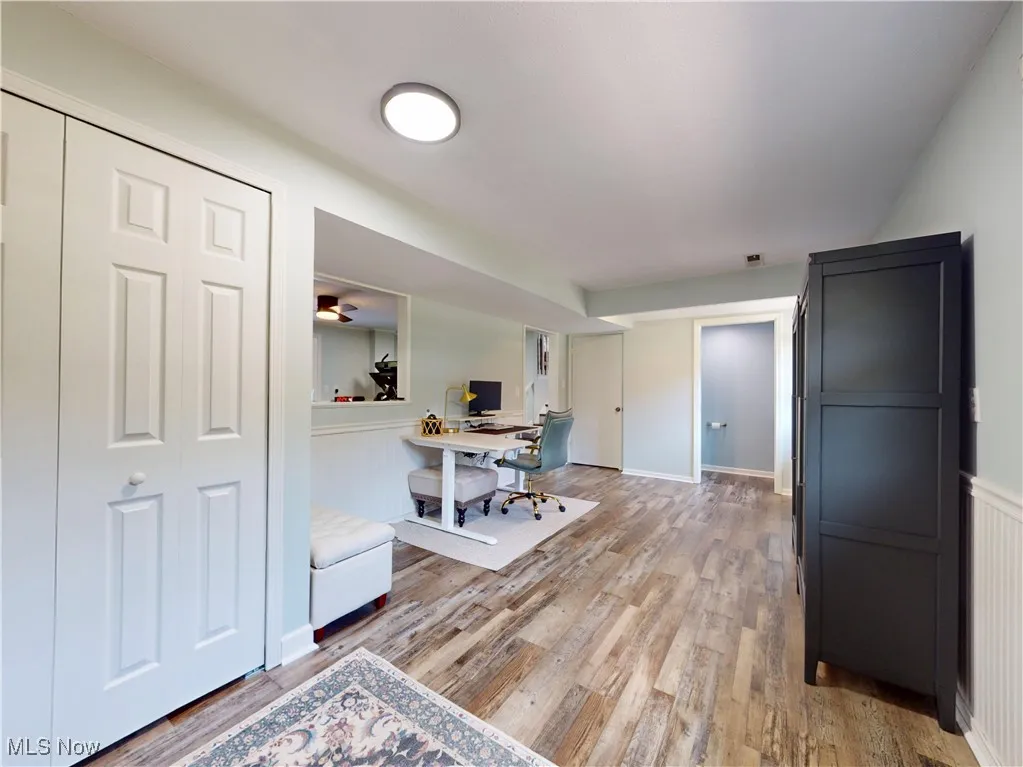 Office space featuring light wood-style flooring