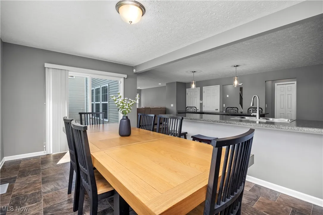 Morning Room currently being used as the dining room, view facing patio and living room