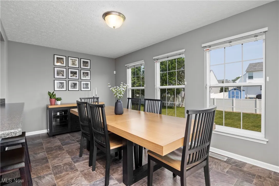 Morning Room currently being used as the dining room, view facing away from patio doors