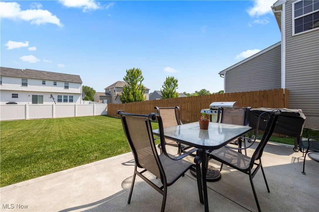 Patio with nice back yard and partially fenced back yard