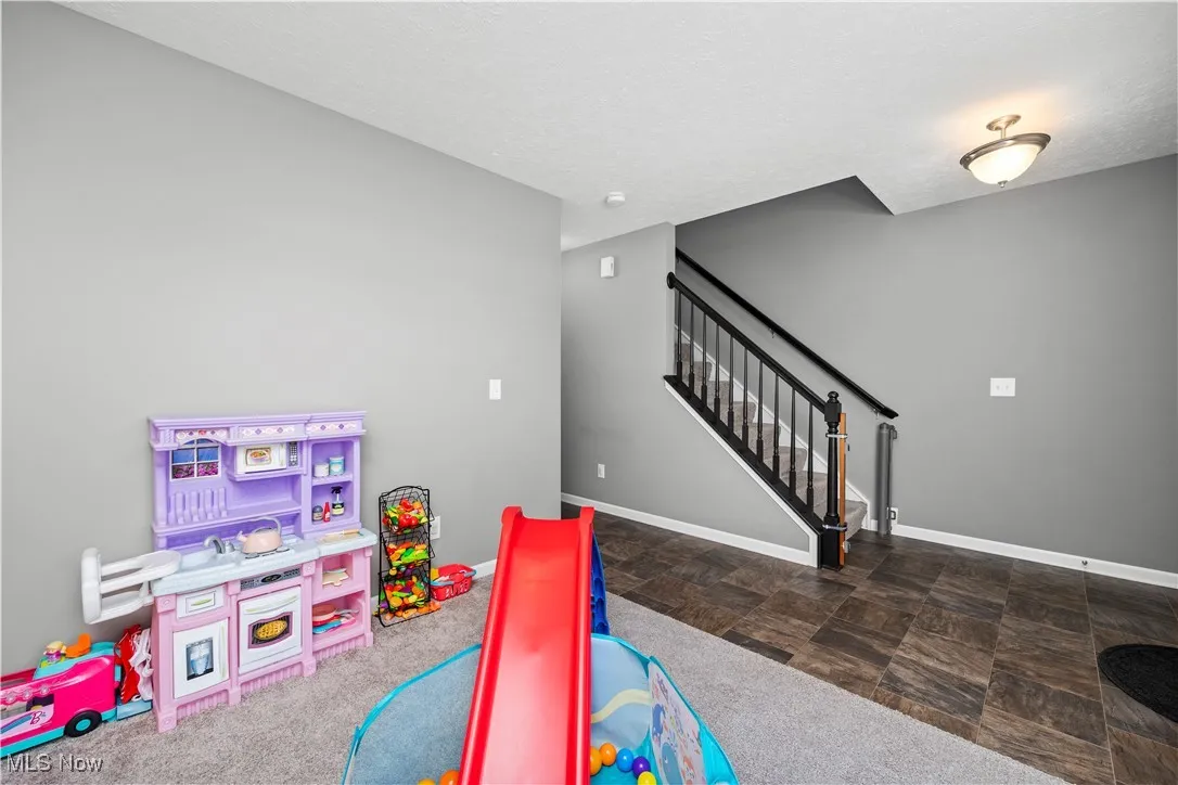 Play room or an office whatever your need is facing staircase and hallway to rest of main floor
