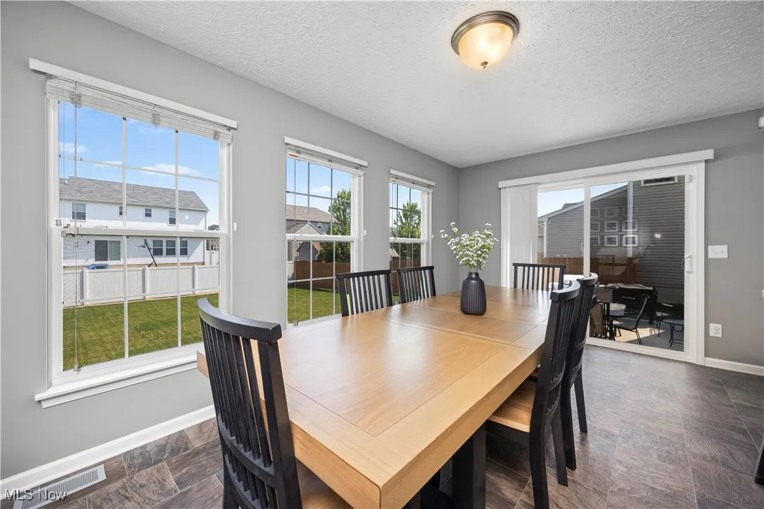 Morning Room currently being used as the dining room, view facing patio are
