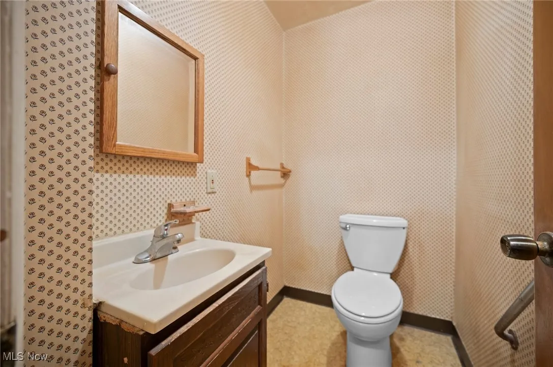 Bathroom with vanity and toilet