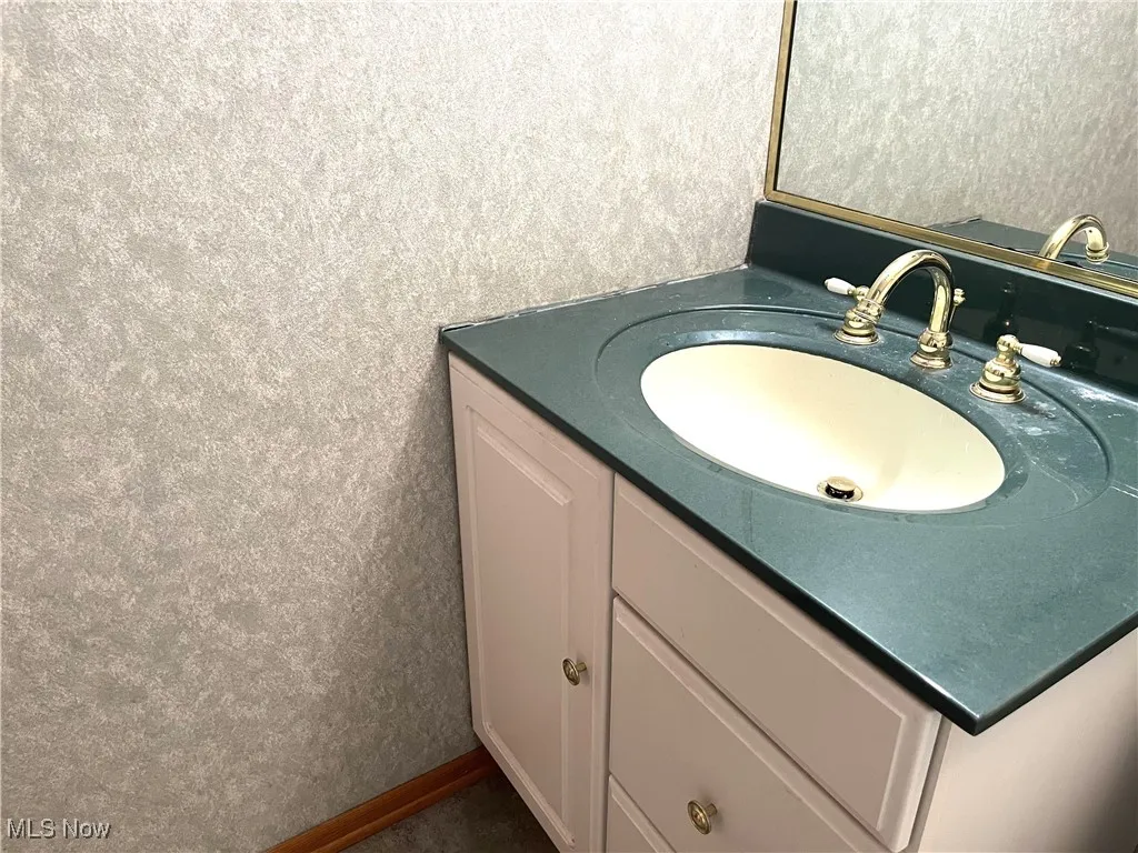 Bathroom featuring vanity
