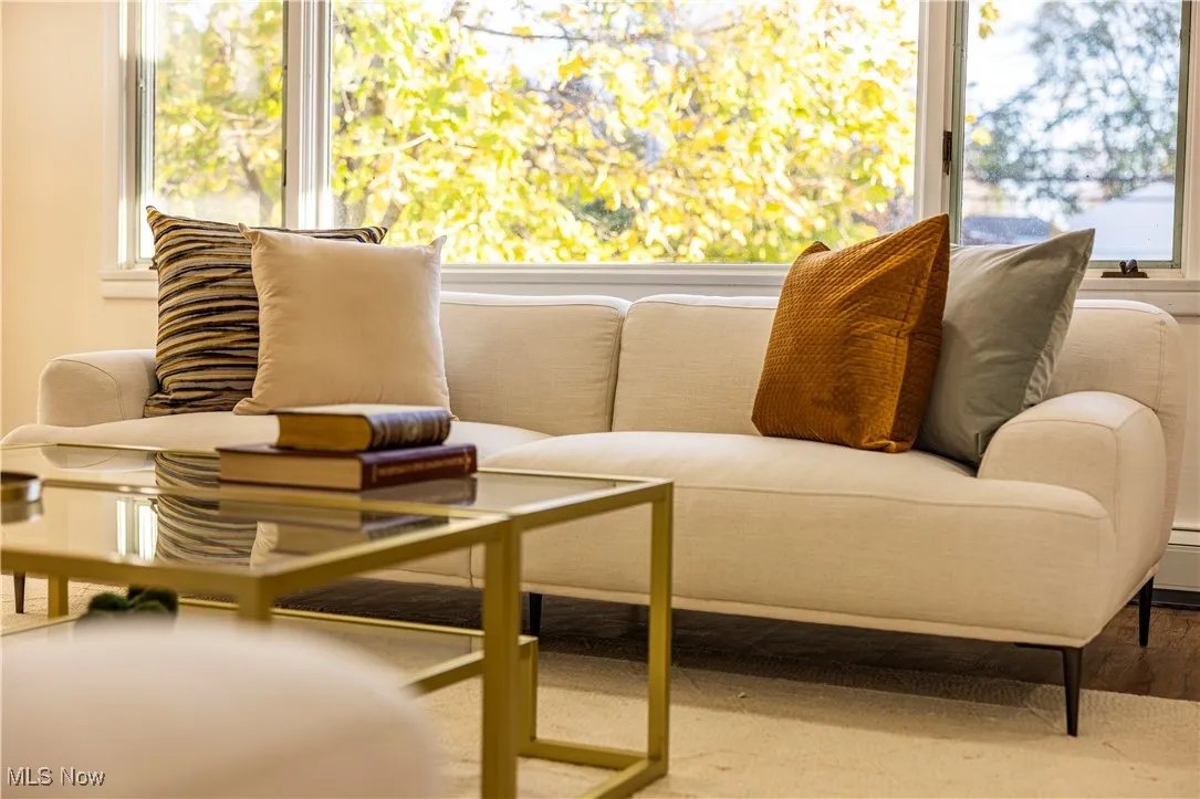 Sitting room with hardwood / wood-style floors