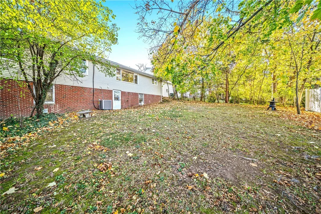 View of yard featuring central AC unit