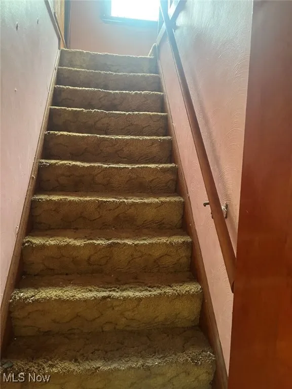 Stairs to upstairs bedroom