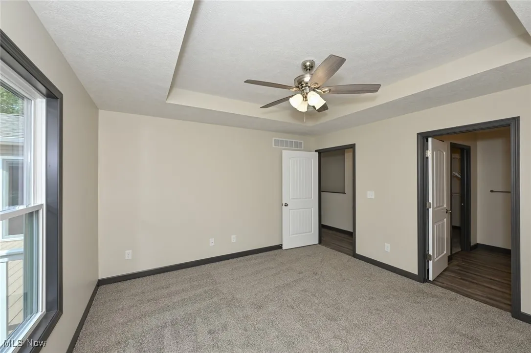 Raised ceiling, on suite bath with walking shower, private toilet and walk-in closet.
