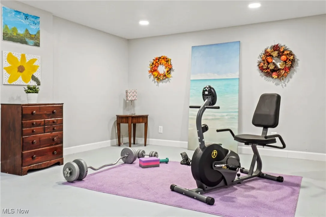 Exercise area featuring recessed lighting