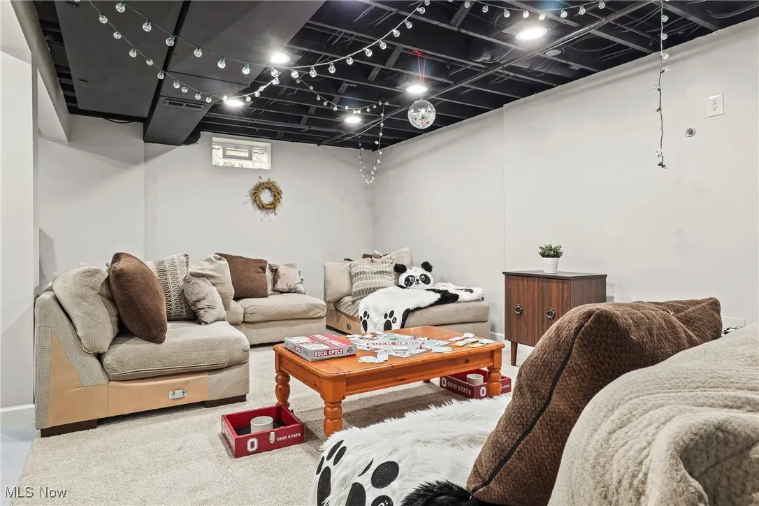 Basement living space perfect for entertaining.
