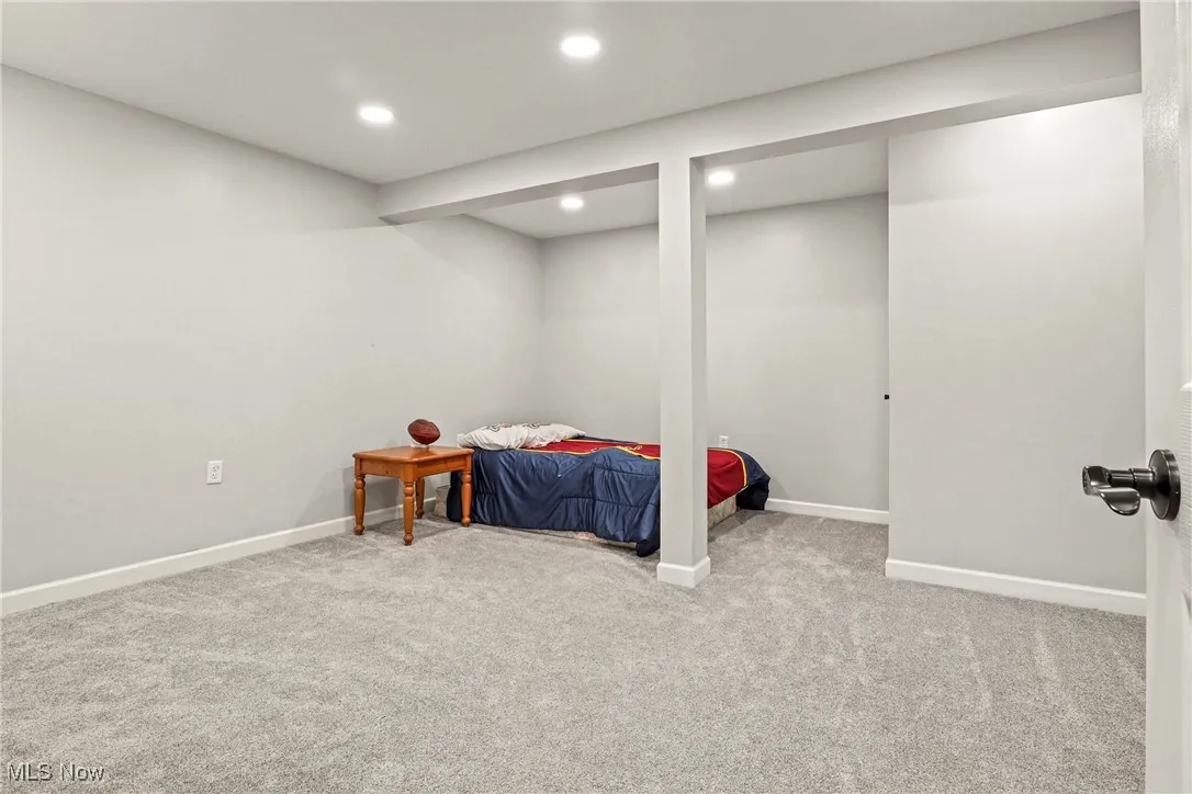 Bedroom with carpet and recessed lighting