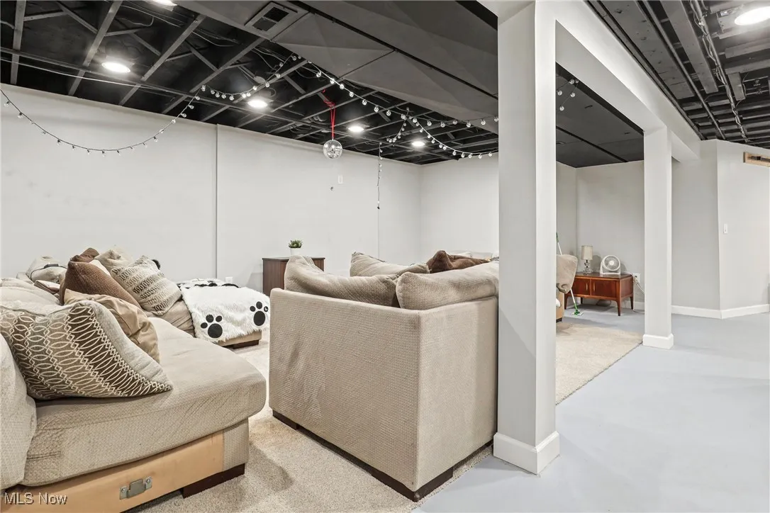 Basement living space perfect for entertaining.